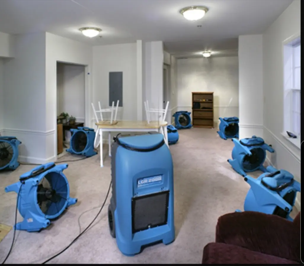 Air movers and dehumidifier setup for Water Damage Restoration in Newark